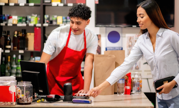 woman paying with credit card